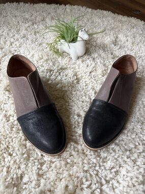 Black Two-Tone color block English and Taupe Slip-On Ankle Booties by Black